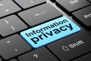 Privacy concept: computer keyboard with word Information Privacy, selected focus on enter button background, 3d render