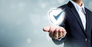 Businessman holding shield protect icon, Concept cyber security safe your data
