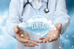 Medical worker shows the data cloud on blurred background.